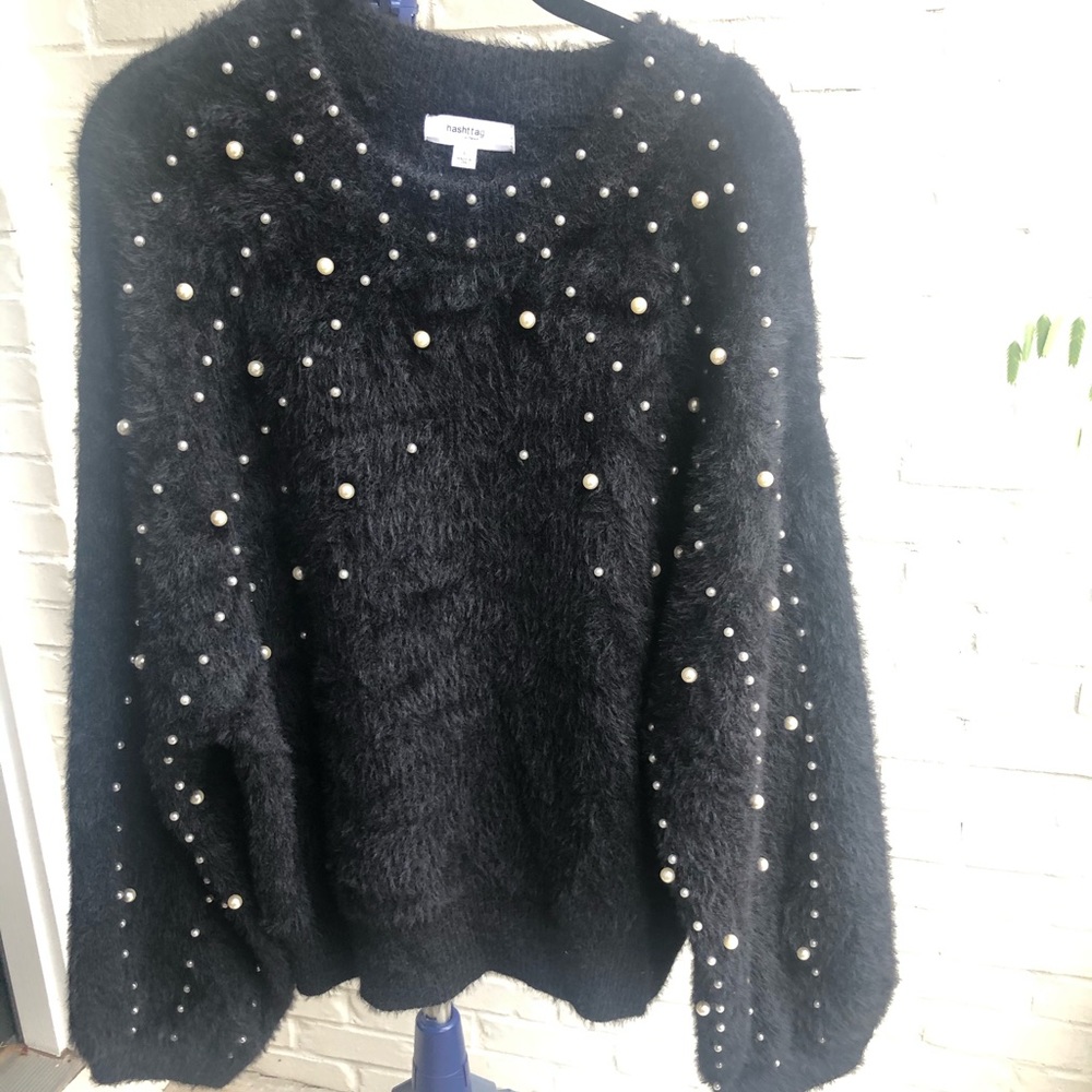 Black sweater with pearl details